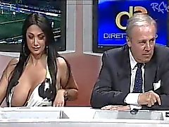 Huge tits girl on Italian news program