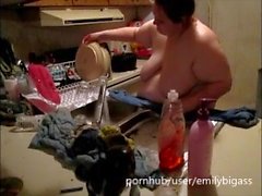 washing dishes naked and playing with a little trash talk