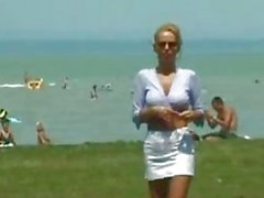 Busty Horny Bitch Pisses On The Beach