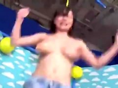 Perky boobs Japanese girl sucks dildo