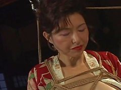 Hot tied up Asian lady with big boobs teased